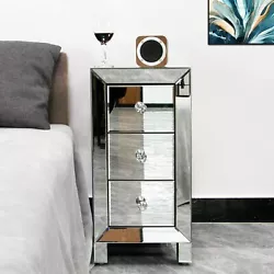 This mirrored glass bedside table with three drawers is sure to add sparkle to your bedroom. Three spacious drawers...