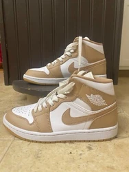 Mens Nike Air Jordan Mid, size 7.5. White with tan. Only worn a couple times. Excellent Condition. No box included. 