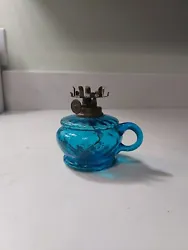 For sale, I have an antique blue miniature oil lamp. The oil lamp has no chips or cracks. The burner is in as pictured...