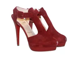 Super hot and elegant heels from Louboutin 2012 collection. Louboutins trademark glossy red soles. Dark red suede in a...