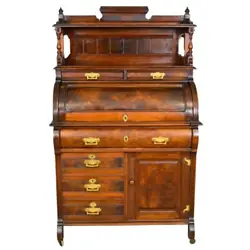 We are pleased to be offering today this Victorian cylinder burl walnut ladies’ desk that dates from the 1880s in...