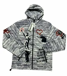 Lightweight hooded jacket features famous Banksy graffiti work. This piece much like his others is satirical, poking...