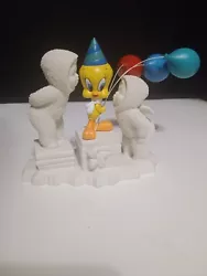 This limited edition Snowbabies figurine from Department 56 features Tweety Bird giving a kiss on New Years Eve. The...