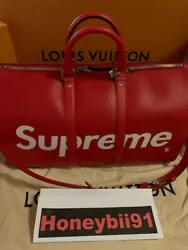 The highly coveted and sought after Louis Vuitton Supreme X Very Limited Edition iconic Keepall 45 red and white epi...